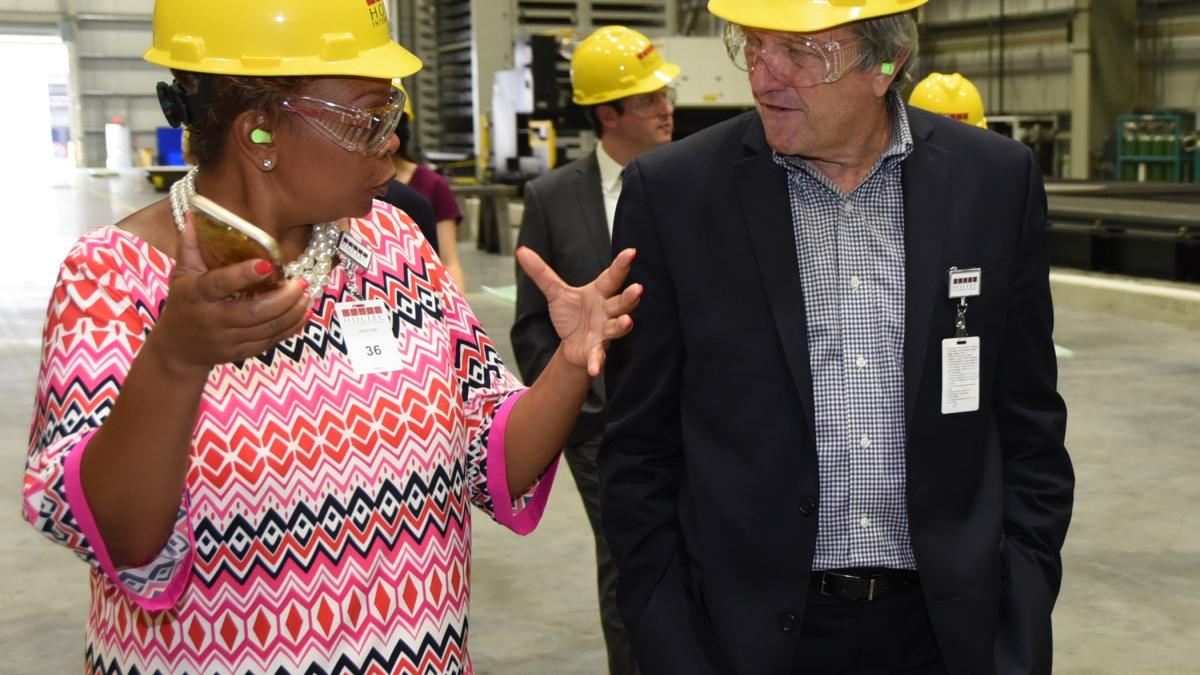 Congressman DeSaulnier at factory wearing hard hat